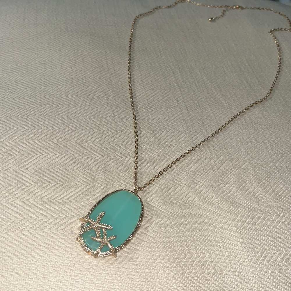 Gold Necklace with Blue stone & two gold starfish